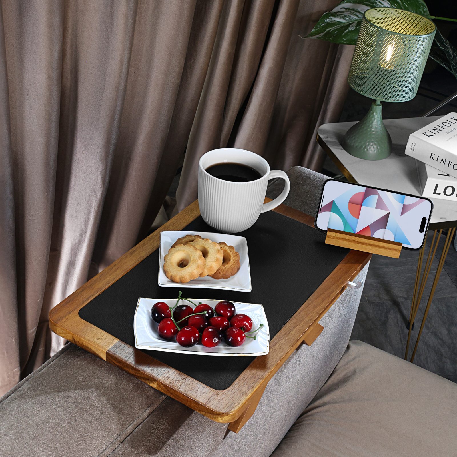 Coffee cup and phone held upright in the rotating phone holder on the acacia tray