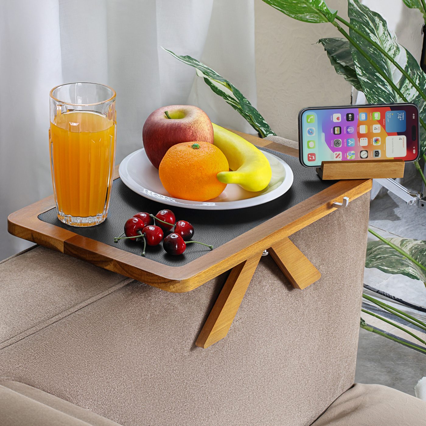 Acacia tray holding breakfast, juice, and a phone
